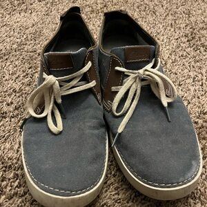 Clarks Men’s Blue Canvas Slip-On Sneaker with Brown Leather Accents